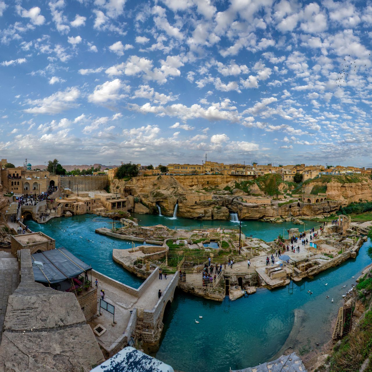 https://www.seeirannow.com/wp-content/uploads/2023/09/Shushtar_Historical_Hydraulic_System_Panorama-1-1280x1280.jpg